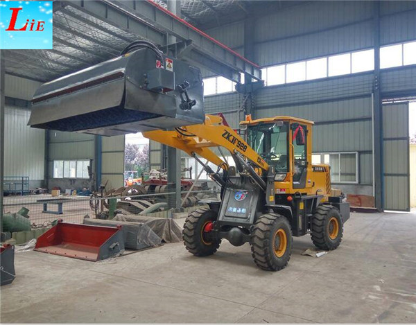 Chinese mini front wheel loader with snow sweeper attachments