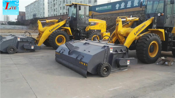 Loader close broom attachments